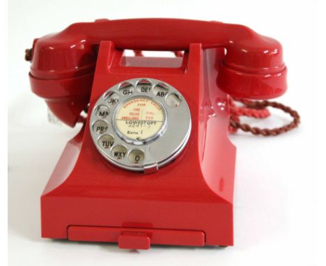 GPO vintage Bakelite telephone in red, model number 332L, paper label "Lowestoft 3241-3, extn 1" with base drawer and red cor