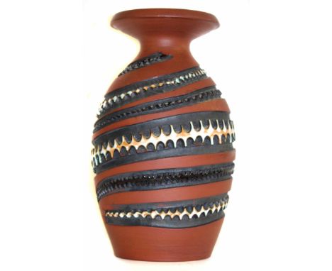 Poole Pottery vase of baluster form with wide spreading neck, heavily incised conjoined tooth style decoration in wrythen ban