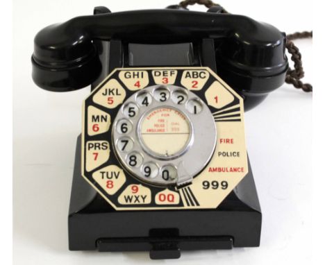 GPO vintage Bakelite telephone in black, model number 332L, unused paper label, applied large numbers and lettered surround, 