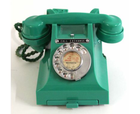GPO vintage Bakelite telephone in green, model number 312L, paper label "Belgravia 5077, extn 37" with base drawer, call exch
