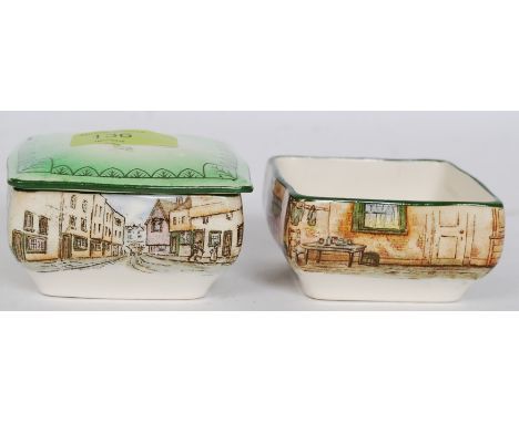 A pair of Royal Doulton Dickens Ware trinket pots marked 2973 one being The Artful Dodger and the other being Mr Squeets. It 