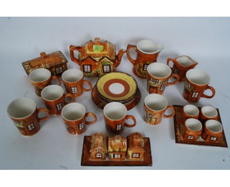 A fantastic collection of Cottage ware ceramics to include tea pot, condiment set, egg cups etc please see images