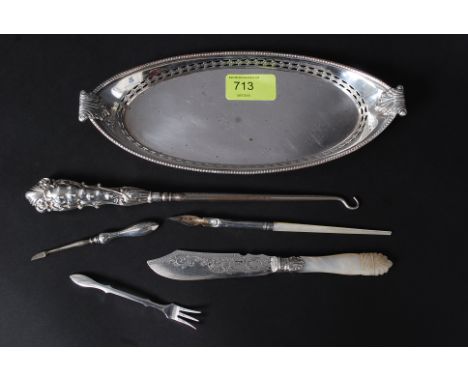 A collection of silver hall marked items to include a button hook Birmingham 1905 by Chrisford and Norris, Pen with mother of
