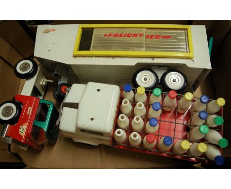Two Triang large scale pressed steel models to include milk float with bottle load, and a Highways series freightliner tracto