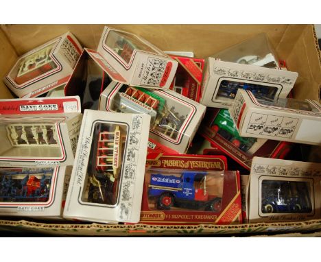 A box of mixed boxed modern issue diecast to include Days Gone and Matchbox Models of Yesteryear, examples to include a 1912 