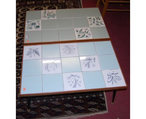 Two similar 1960s teak and Poole pottery tile-top rectangular coffee tables, raised on ebonised turned supports, length 79cm 