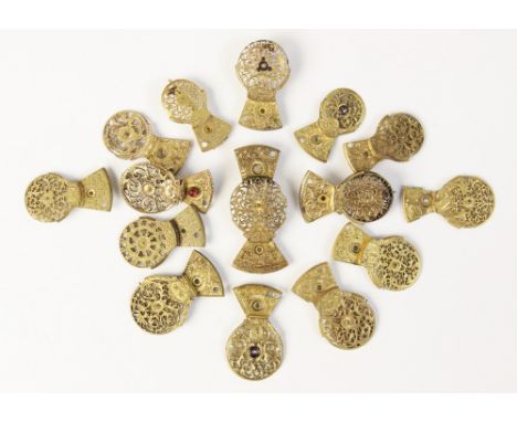 A selection of gilt pierced and engraved pocket watch balance cocks, five with later added brooch fittings to reverse, smalle