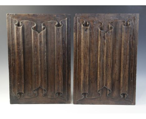 A pair of Elizabethan linen fold panels, Tudor, circa 1560, 43.5cm x 30cm (2)Condition reportMinor chips and splits to the ed