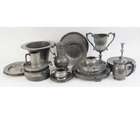 A selection of pewter ware, to include a Liberty &amp; Co Tudric pewter three-piece tea service, each numbered '01075', A Vic