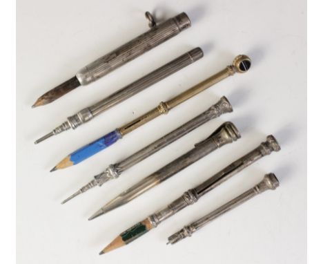 A Victorian mechanical pencil by Sampson Mordan &amp; Co, the gold coloured pencil with engine turned decoration and three-si