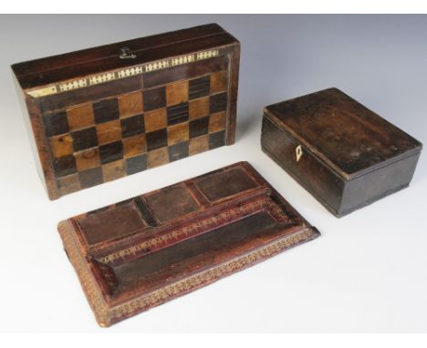 A 19th century mahogany games box, the exterior inlaid with a chess board, opening to an inlaid backgammon board, 30cm wide, 