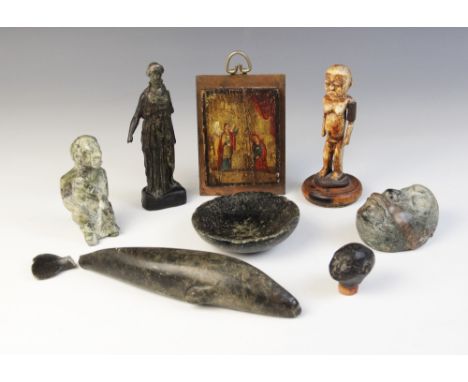 A selection of carvings and objects of virtue, to include a miniature icon depicting the annunciation, oil on board, indistin