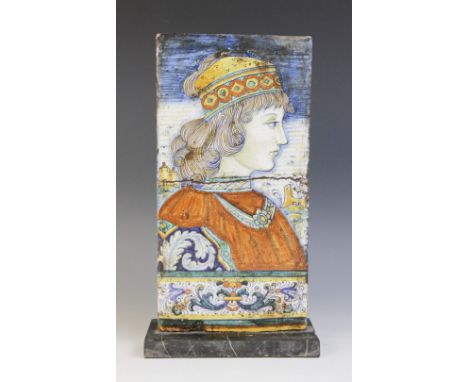 A Renaissance Revival majolica terracotta floor tile, in the manner of Alvaro Binaglia, depicting the profile of a Renaissanc