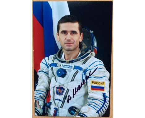 Cosmonaut Y Malenchenko signed 6 x 4 colour White Space suit astronaut portrait photo. Good condition. All autographs are gen