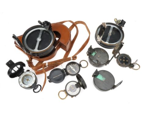 A Collection of Surveying Compasses,comprising of a large compass in a leather case by E. R. Watts, London, a smaller compass