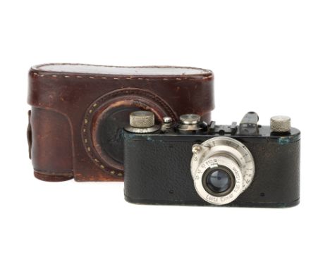 A Leica I Rangefinder Camera1931, black, serial no. 65273, shutter working, with Leitz Elmar 50mm f/3.5 lens, optics G, some 