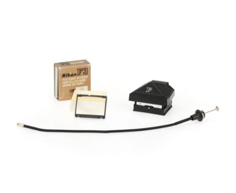 A Nikon F3 Type K Focusing Matte,together with a Nikon F prism, &amp; a shutter release cable,