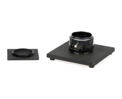 An Unusual Bench Device,made from the outer body &amp; helicoid from a Pentax SMC 50mm f/1.4 lens, with a larger board to the