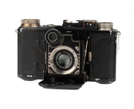 A Zeiss Ikon Super Nettel 536/24 Camera,black, serial no. Y61715, with Carl Zeiss Jena Tessar f/3.5 50mm lens, body, F-G, shu