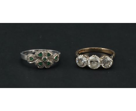 A 9 ct Gold Three Stone Cubic Zirconia Ring,with 1 ct size central stone flanked by two half ct examples, size P 1/2; plus a 