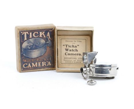 A Houghton Ticka Watch Pocket Sub Miniature Camera,chrome, body VG-E, shutter working on I, slow to return on T, in original 