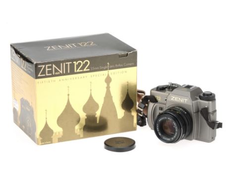 A Zenit 122 Fiftieth Anniversary Edition 35mm SLR Camera,faux titanium (plastic), body VG-E, shutter working but mirror does 