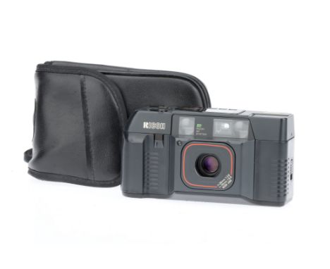 A Ricoh TF-900 35mm Compact Camera,body G-VG, shutter working, lens extends, works when batteries are inserted, optics G-VG, 