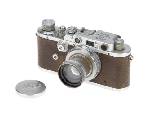 A Leica IIIc Rangefinder Camera,chrome, serial no. 191322, with Leitz Summar f/2 50mm lens, chrome, serial no. 205895, body, 