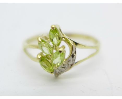 A 9ct gold, peridot and diamond ring, 1.1g, O