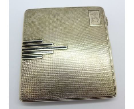 A silver Art Deco cigarette case decorated with black enamel, 131g