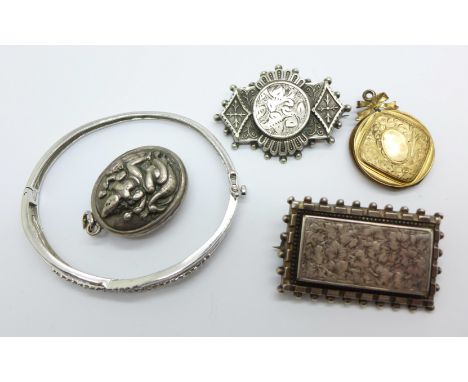Two Victorian brooches, two lockets, one a/f and a bangle
