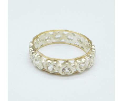 A 9ct gold, silver and white stone eternity ring, K