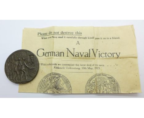 A German Lusitania Naval Victory medal and propaganda leaflet