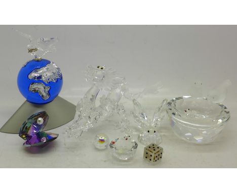 A collection of Swarovski glass including a dragon, a globe and a dish with two birds, butterfly a/f