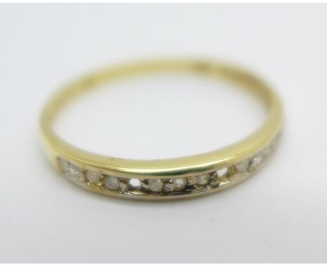 A 9ct gold and diamond half eternity ring, 0.7g, O, lacking two stones