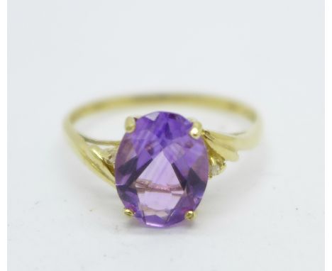 A 9ct gold, amethyst and diamond ring, 1.3g, O