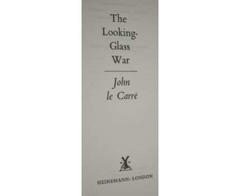 John Le Carre, "The Looking-Glass War", Heineman, 1965, first edition with torn dust wrapper and Terry Pratchett "The Carpet 