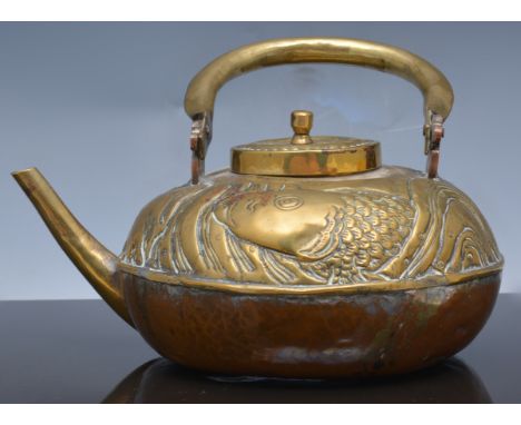 Eastern embossed brass and copper kettle, four Arts & Crafts copper shallow bowls, engraved H. Barnes, Thornton Le Dale (5).