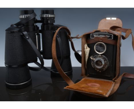 Voigtlander Reflex Camera, leather case, other cameras, a pair of 12 x 50 binoculars and other binoculars.