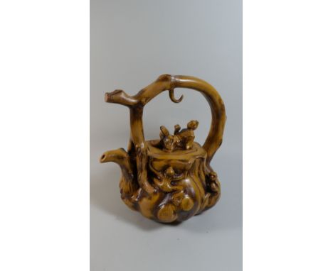 A Large 20th Century Oriental Terracotta Hand Thrown and Moulded Tea Pot. The Body as a Tree Stump with Monkeys. The Lid with