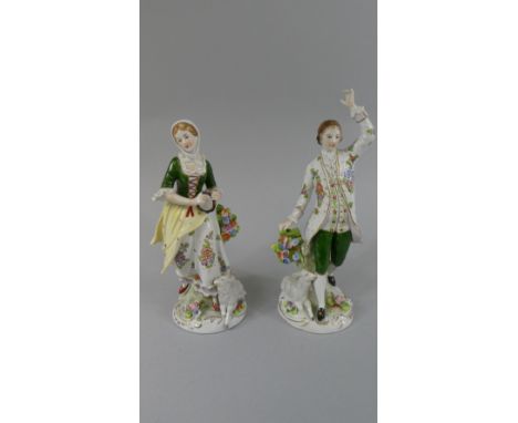 A Pair of Late 19th Century Sitzendorf Figures depicting Dancing Shepherd and Shepherdess with Tambourine. 22cms High