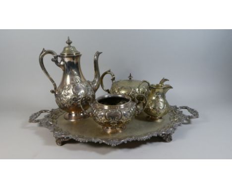 A Late Victorian Silver Plated Two Handled Tray together with a Four Piece Silver Plated Tea Service.