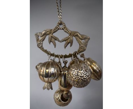 An Unusual Silver Plated Wall Hanging Decorated with Birds from Which Hang Six Fruits and a Ladle. 