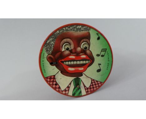 A Vintage Chad Valley Circular Novelty Money Bank with Minstrel Motif. Working but no Key and Missing Feet. 11.5cms Diameter 
