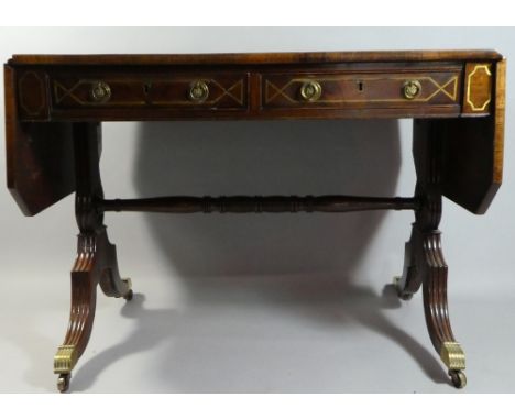 A Mid 19th Century Brass Inlaid Flame Mahogany Drop Leaf Sofa Table with Rosewood Crossbanding. Two Side Drawers Matched by D