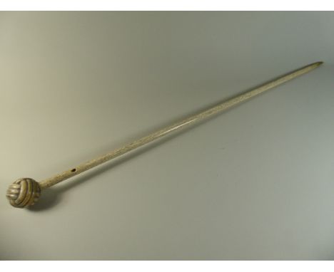 An Early 19th Century Bone Walking Stick with Carved Ivory Novelty Handle as a Ball of Wool. Tapering Turned Shaft. 95cm Long