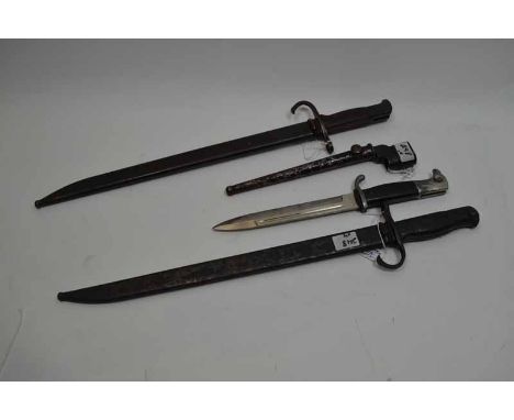 Four Bayonets i) Type 30 Japanese with scabbard ii) Type 30 Japanese with scabbard iii) Mk II, No.4, spike bayonet with scabb