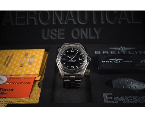 A GENTLEMAN'S TITANIUM BREITLING EMERGENCY BRACELET WATCH DATED 2003, WITH COMPLETE BOX &amp; PAPERS 
D: Black dial with Arab