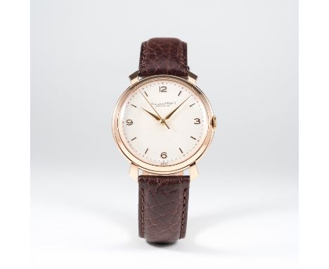 A RARE GENTLEMAN'S LARGE SIZE 18K SOLID PINK GOLD IWC WRIST WATCH CIRCA 1950s 
D: Silver dial with gilt batons &amp; quarterl