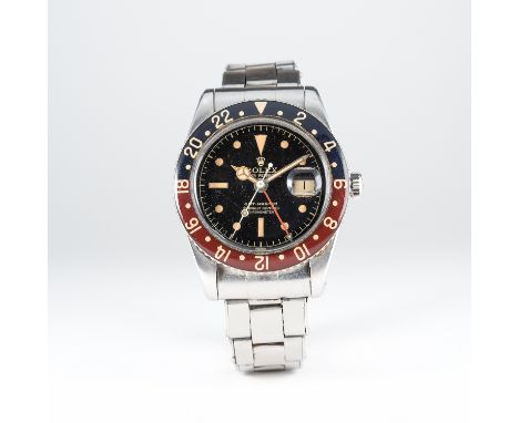 AN EXTREMELY RARE GENTLEMAN'S STAINLESS STEEL ROLEX OYSTER PERPETUAL GMT MASTER BRACELET WATCH CIRCA 1959, REF. 6542 WITH ORI